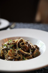 Spaghetti truffle cream sauce with mushroom