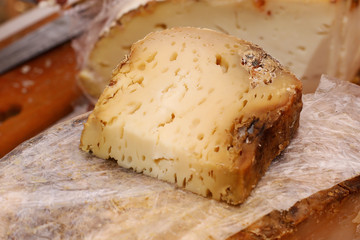 Solid cheese with mold, home-made.