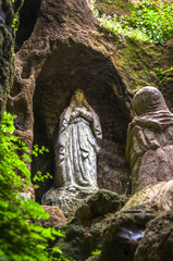 Fototapeta na wymiar Statue of the Virgin inside Cave Church Piedigrotta