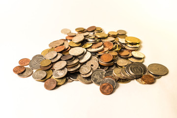 Many coins from different countries of the world