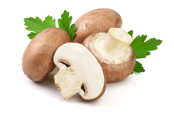 Royal Brown champignon with half and parsley leaf isolated on white background