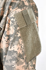 Military clothes and velcro. White isolated background.