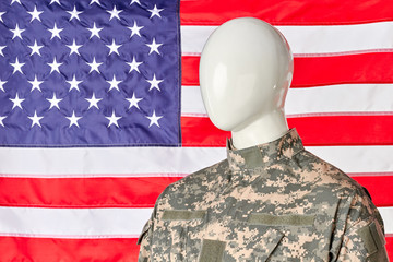Abstract american army soldier patriot in military uniform. USA flag background.