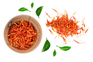 Fototapeta premium Heap of saffron in wooden bowl isolated on white background. Top view. Flat lay