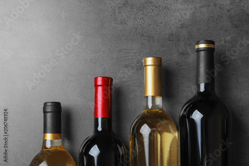 Download Bottles With Delicious Wine On Grey Background Top View Stock Photo And Royalty Free Images On Fotolia Com Pic 206748924 Yellowimages Mockups