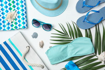 Composition with beach objects on white background