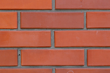 Texture of a red brick wall background