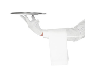Young waiter with empty tray on white background