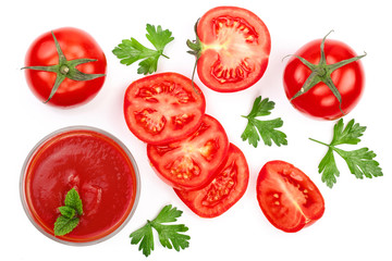 Tomato juice in glass and tomatoes with parsley leaves isolated on white background. Top view. Flat lay