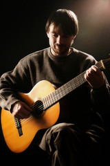 Fototapeta premium Acoustic guitar player. Classical guitarist