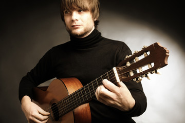 Acoustic guitar player. Classical guitarist