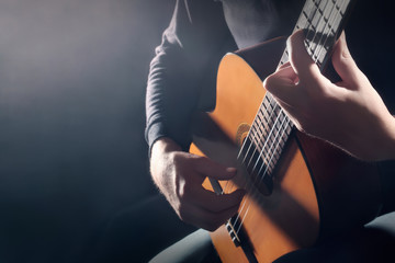 Acoustic guitar player. Classical guitarist hands