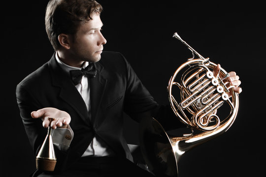 French horn player classical musician portrait