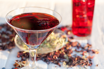 Red Hot Hibiscus tea in a glass mug