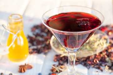 Red Hot Hibiscus tea in a glass mug