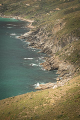 Waves crashing against a rocky shoreline