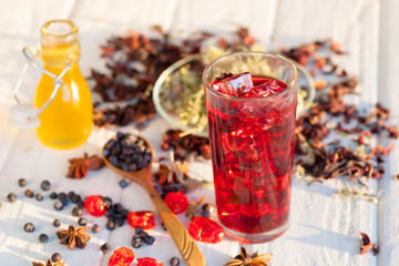 Red Hot Hibiscus tea in a glass mug
