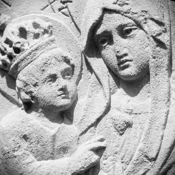Fragment of ancient statue of the Virgin Mary with the baby Jesus Christ  (Religion, faith, eternal life, God, the soul concept)