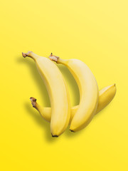 Bananas on pastel yellow background. Minimal fashion. Albino Different Creativity Creative Thinking Ideas Concept. Free space for text