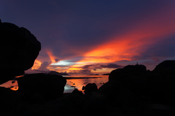 Beautiful scenery sunset or sunrise dramatic sky view of the sea and reflection in water.