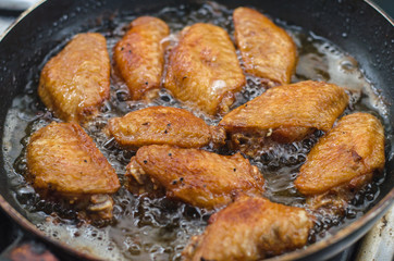 Fried chicken on the pan, asia food, unhealthy food