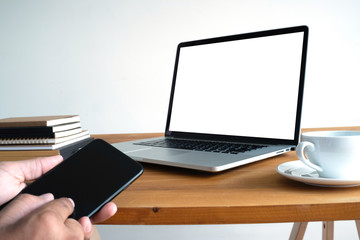 Laptop with blank screen on table. Workspace background new project on laptop computer with blank copy space screen for your advertising text message