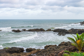 View of rocky beach at late afternoon