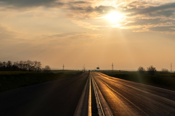 Sunset above new road