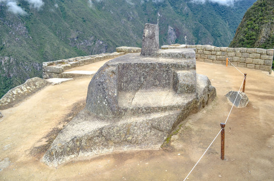 The Intiwatana (or Inti Watana), a ceremonial stone located within the Machu Picchu archaeological site. Cusco, Peru.