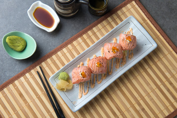 salmon sushi roll flat lay