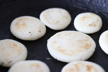 Cooking arepas in the pan