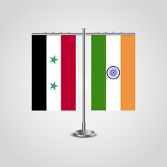 Table stand with flags of Syria and India.Two flag. Flag pole. Symbolizing the cooperation between the two countries. Table flags