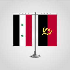 Table stand with flags of Syria and Angola.Two flag. Flag pole. Symbolizing the cooperation between the two countries. Table flags