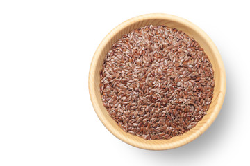 Flax seeds in a wooden bowl on white background