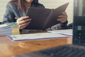 Business and finance concept of office working, Businesswoman holding notebook