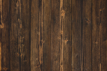 Dark brown wood texture with natural striped pattern background