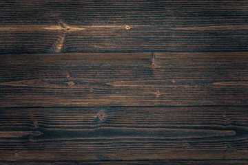 Fototapeta premium Dark brown wood texture with natural striped pattern background