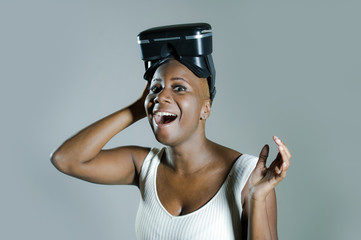 happy black afro american woman showing VR 3d vision goggles aft