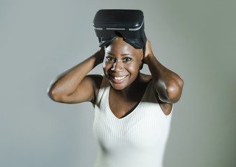 happy black afro american woman showing VR 3d vision goggles aft