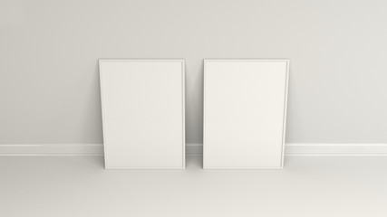 Blank white poster in white frame standing on the floor