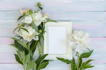 peonies on a wooden background, picture for a blog or article, wedding concept