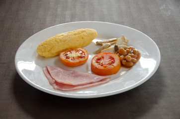 American breakfastwith omelet egg and ham
