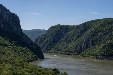 Fototapeta na wymiar Danube border between Romania and Serbia. Landscape in the Danube Gorges.The narrowest part of the Gorge on the Danube between Serbia and Romania, also known as the Iron Gate.