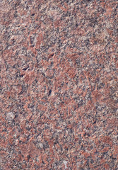 red granite background. texture, pattern, vignette.