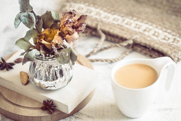 still life of a book and a cup of coffee
