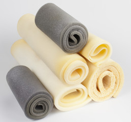 foam, samples of gray and yellow color, in rolls, composition - obrazy, fototapety, plakaty