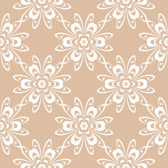 Fototapeta premium White floral ornament on beige background. Seamless pattern