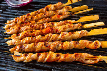 Fresh and crispy rustic pork belly grill sticks