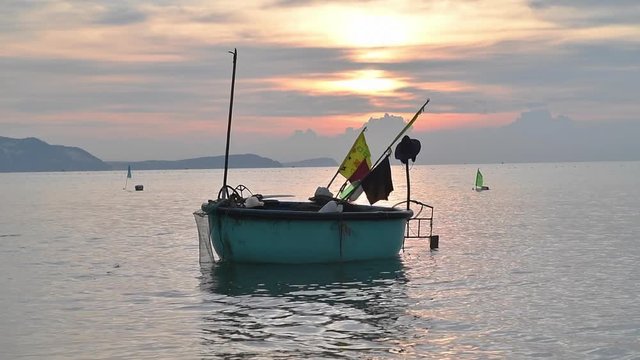 Local fishing boats in the sea with beautiful sky on morning at Phat Thiet, Mui Ne, Vietnam