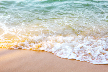 waves hit the beach.